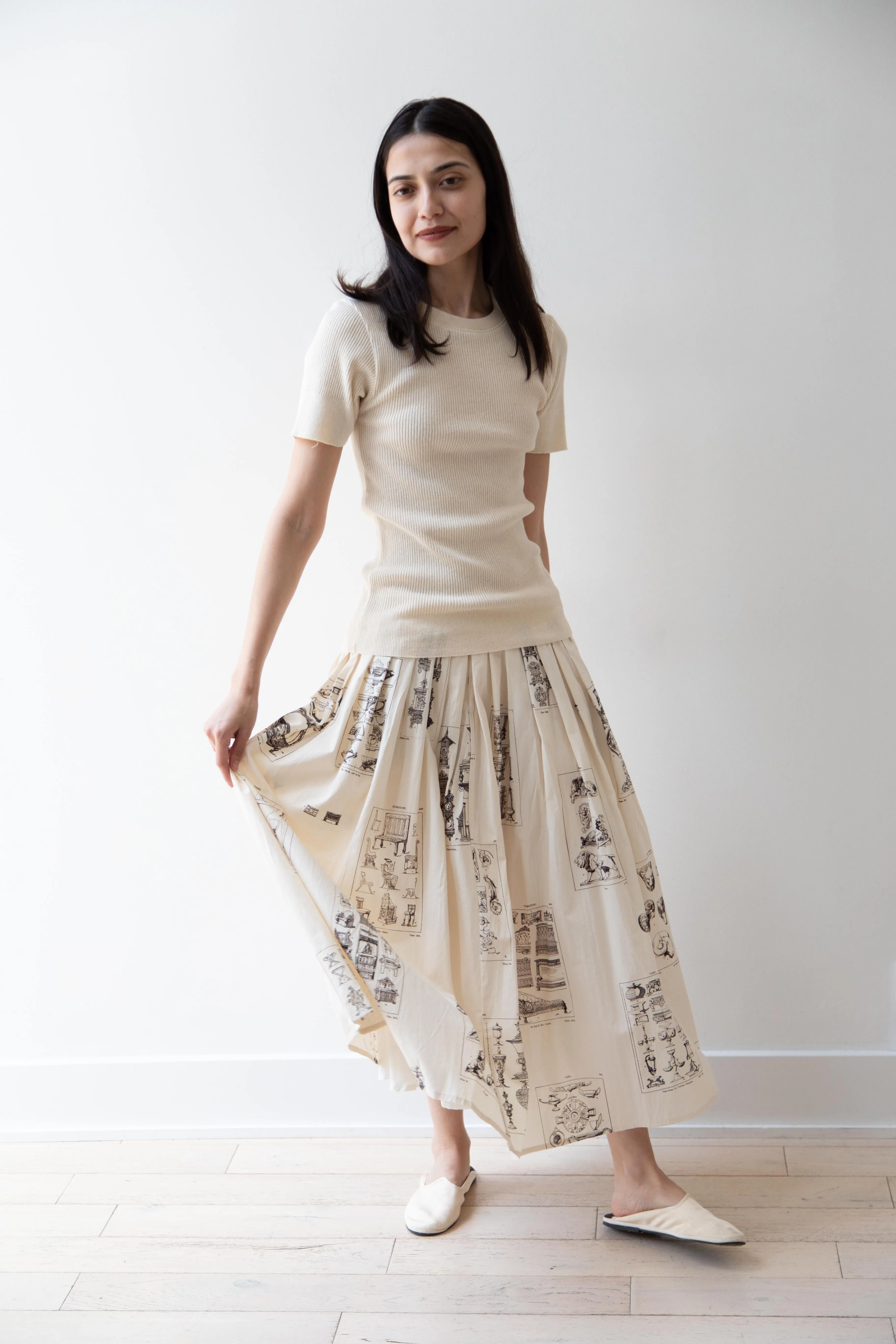 Aleksandr Manamïs | Pleated Skirt in Architectural Ornaments