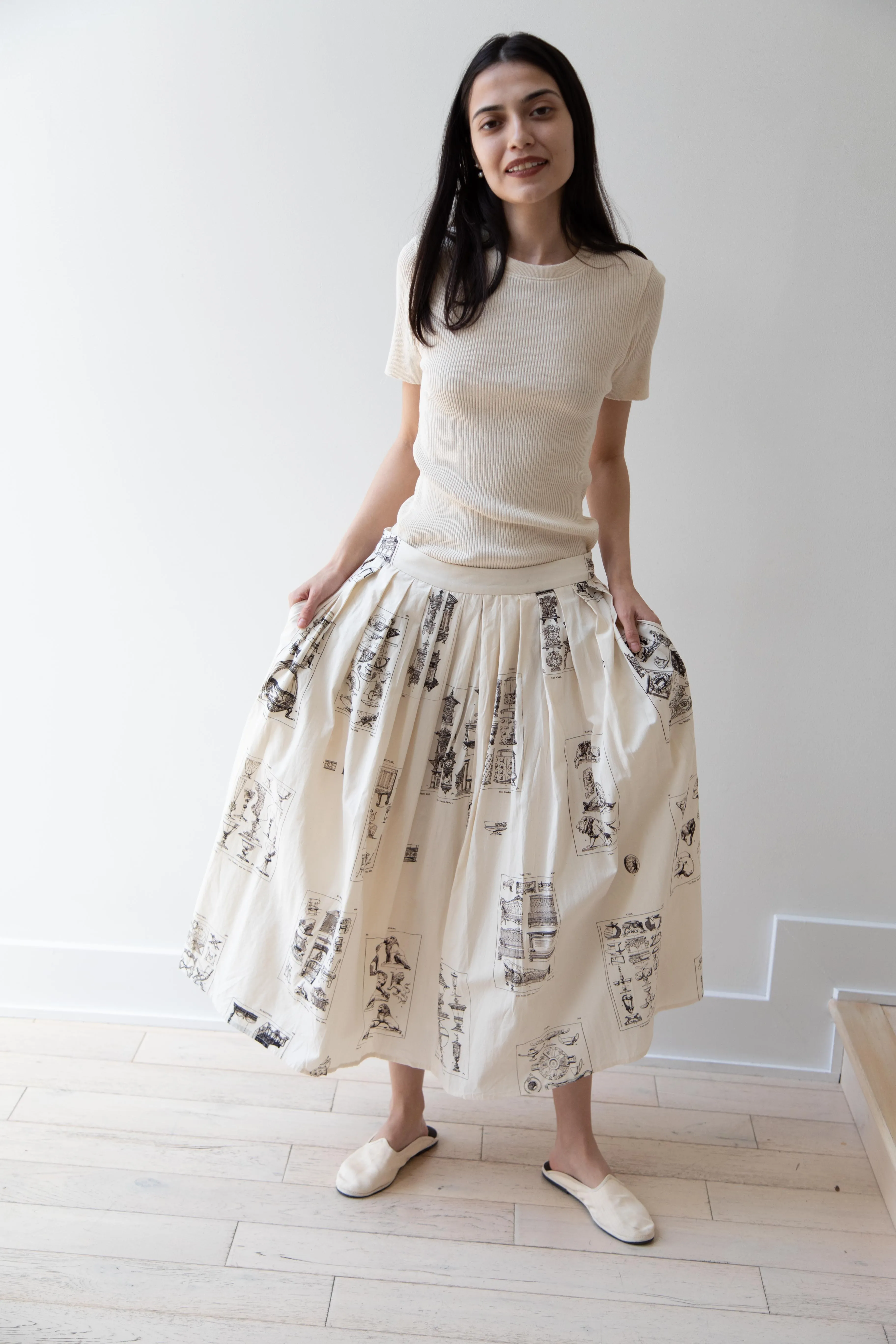 Aleksandr Manamïs | Pleated Skirt in Architectural Ornaments