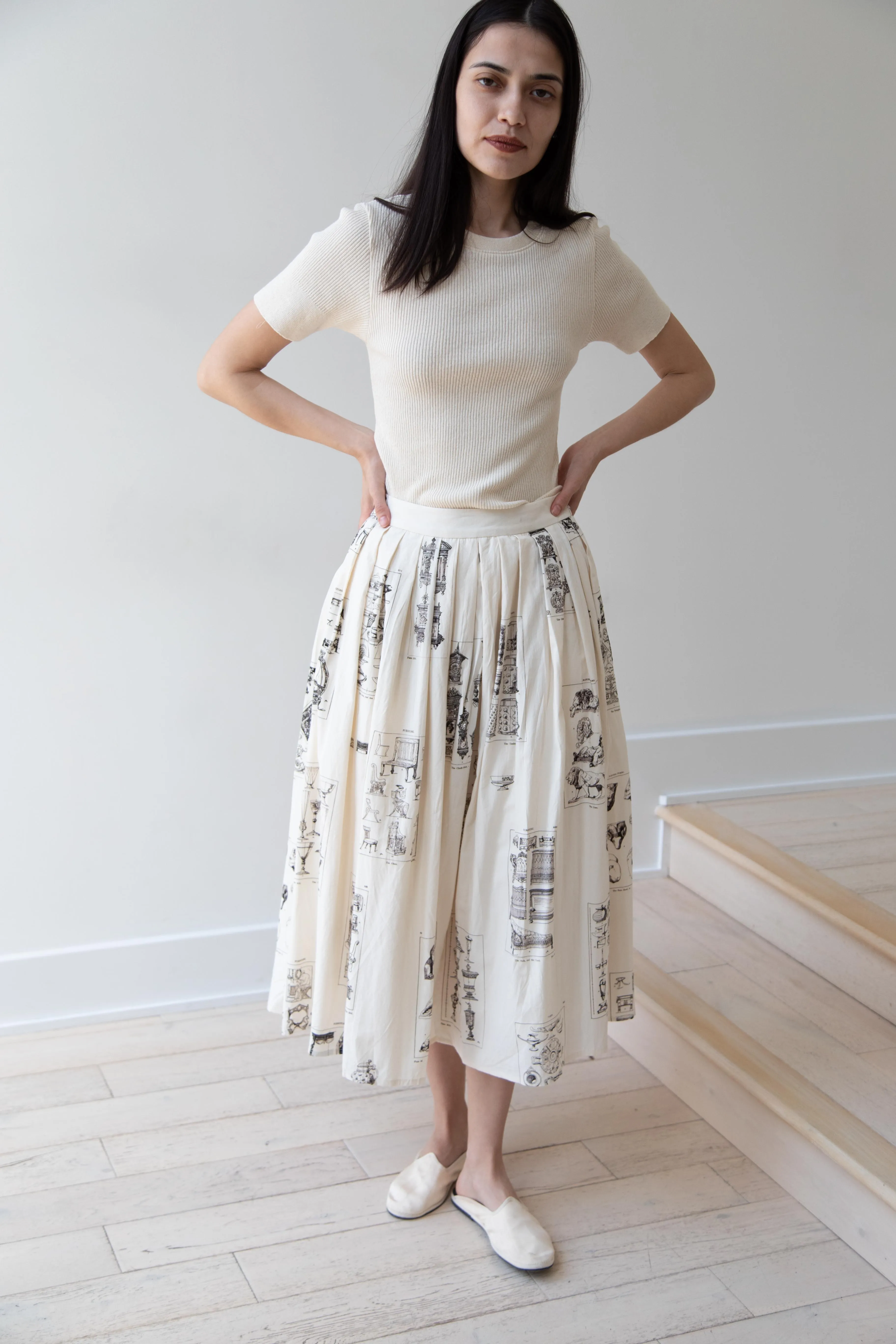 Aleksandr Manamïs | Pleated Skirt in Architectural Ornaments