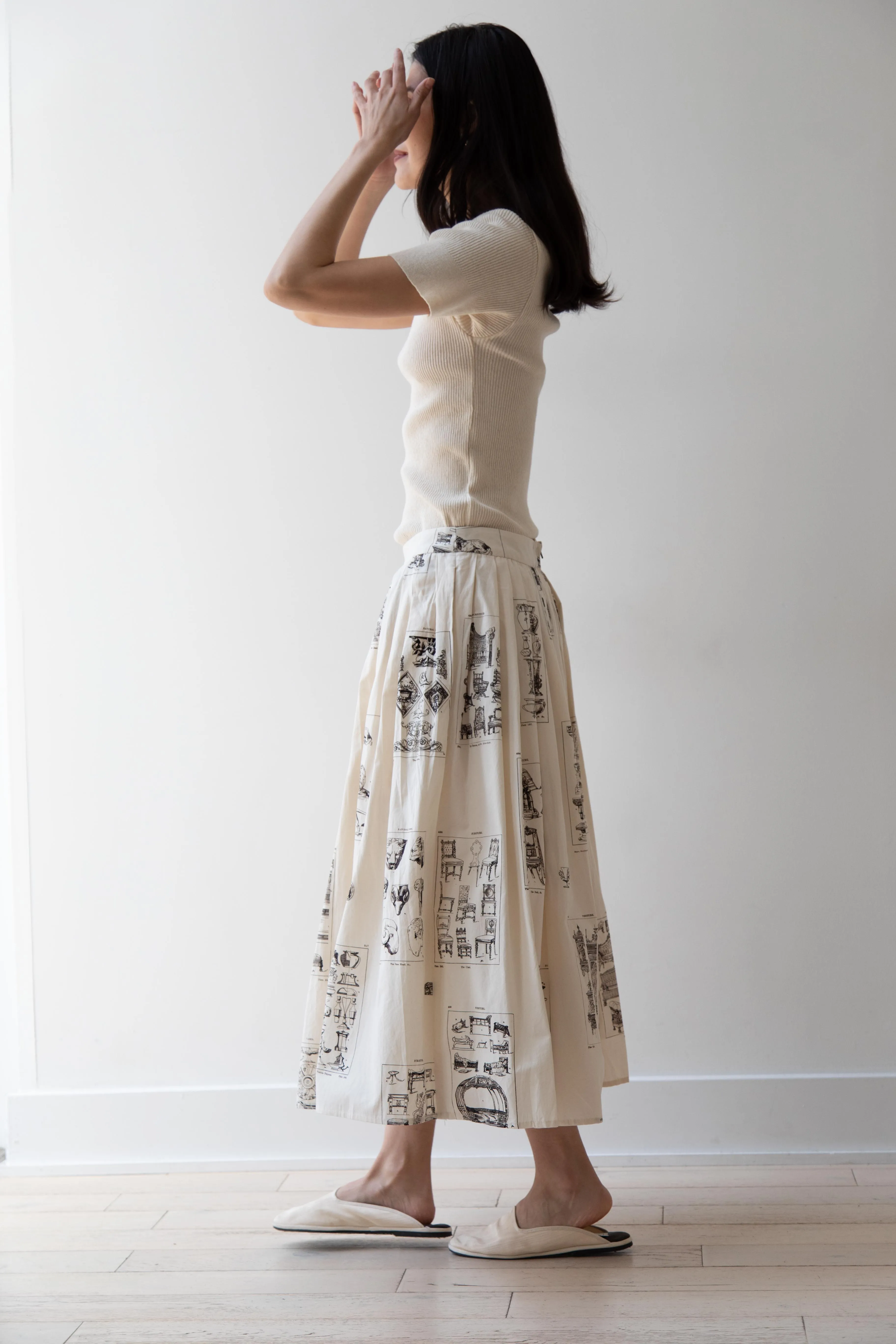 Aleksandr Manamïs | Pleated Skirt in Architectural Ornaments