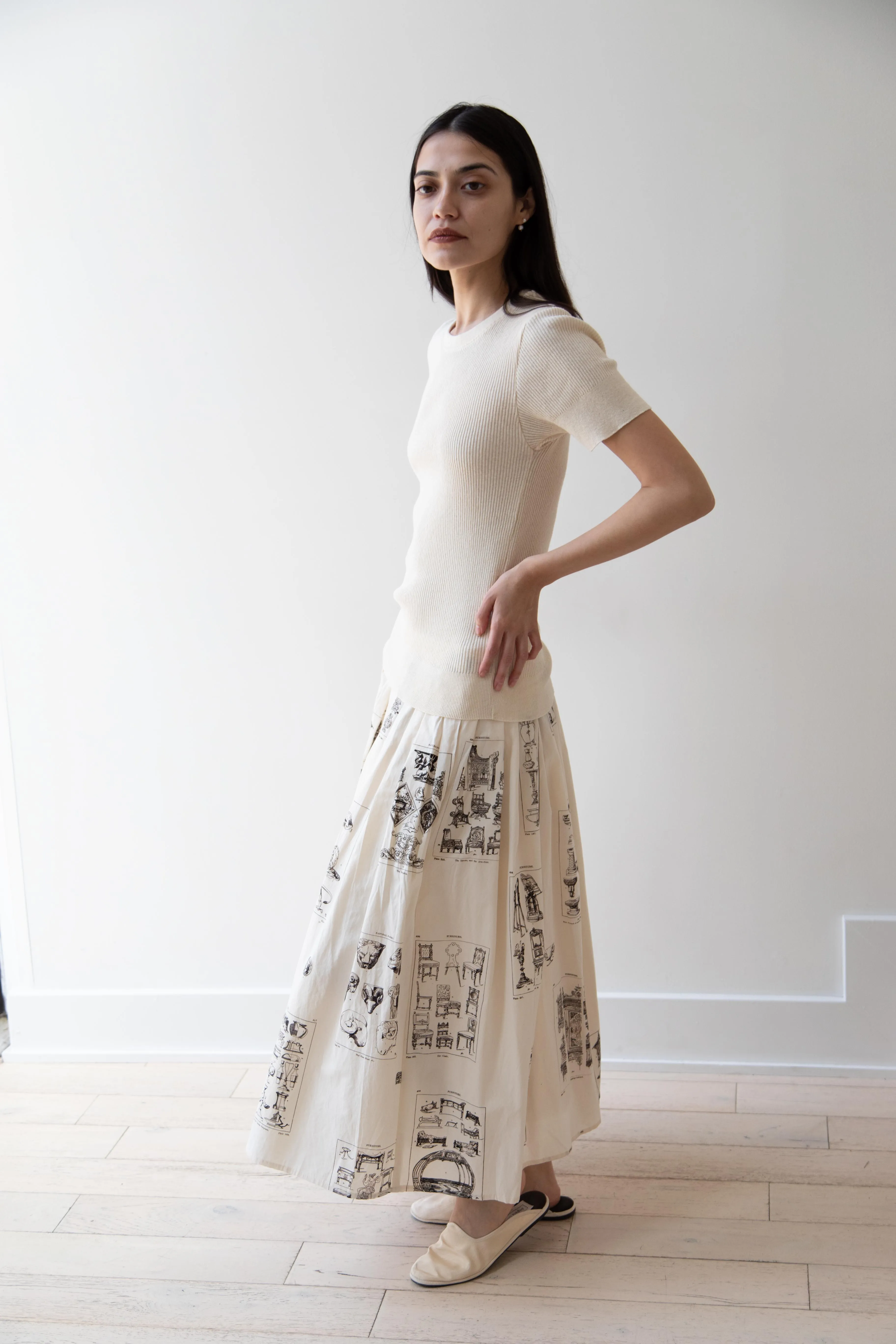 Aleksandr Manamïs | Pleated Skirt in Architectural Ornaments