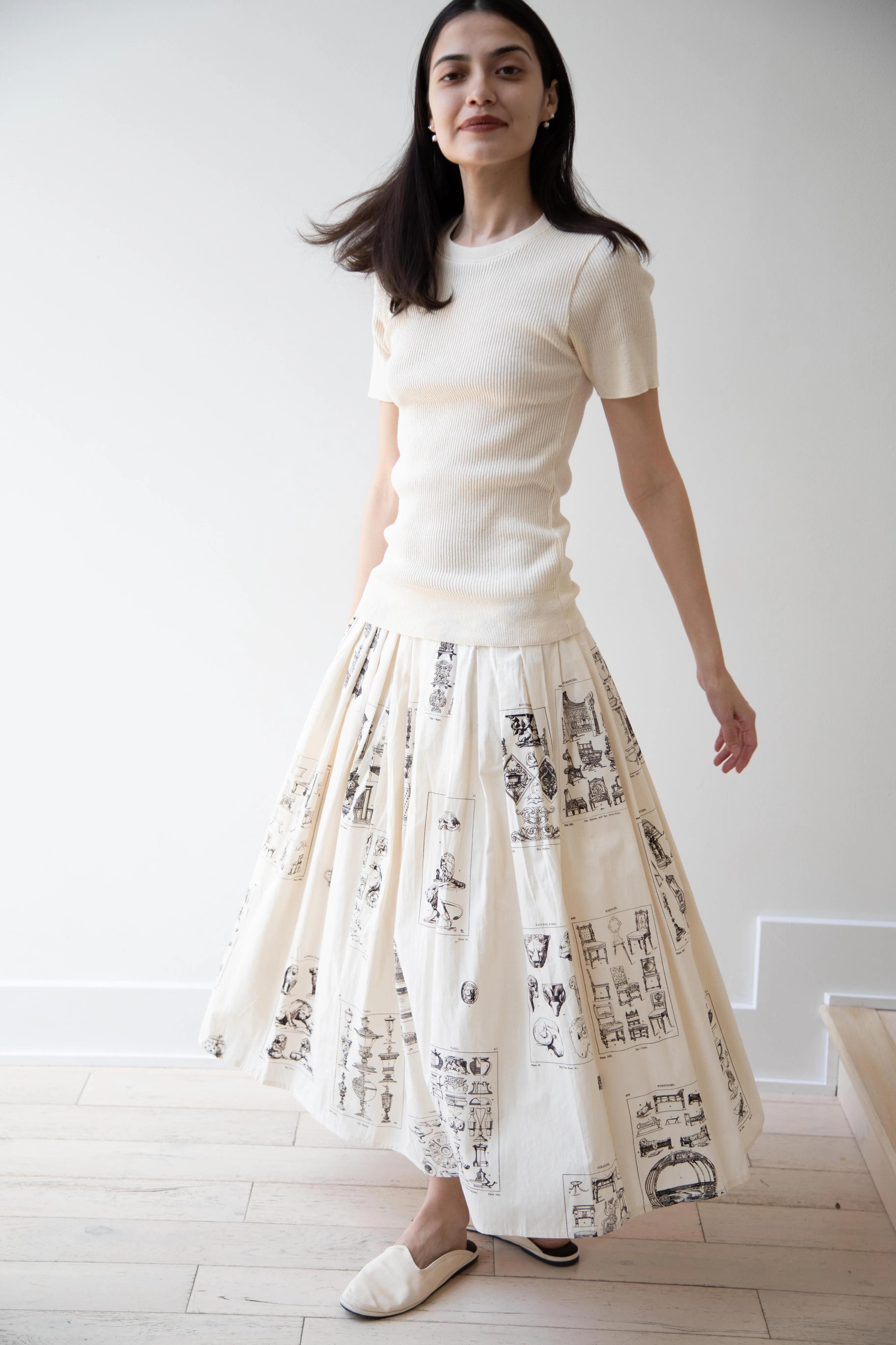 Aleksandr Manamïs | Pleated Skirt in Architectural Ornaments