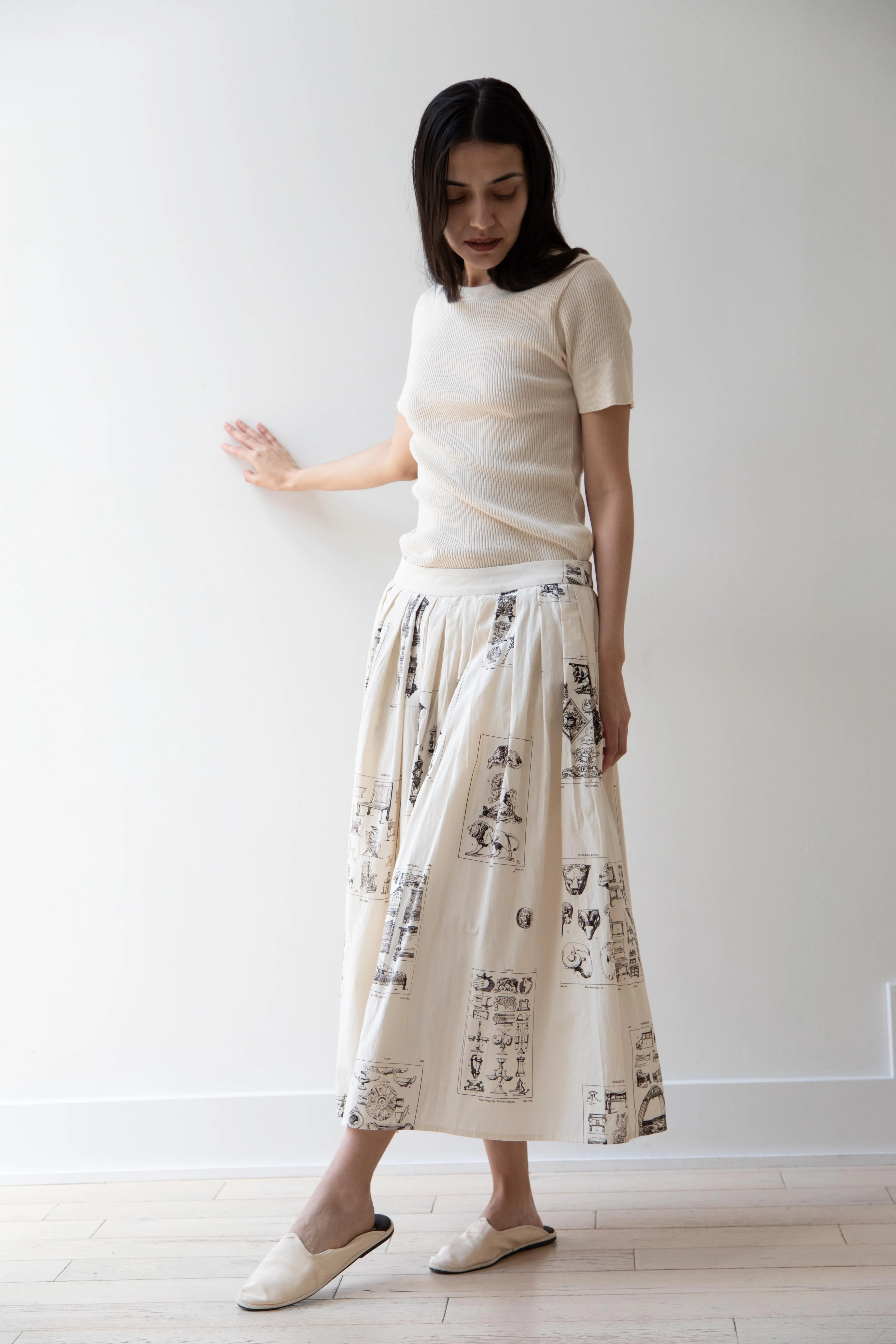 Aleksandr Manamïs | Pleated Skirt in Architectural Ornaments
