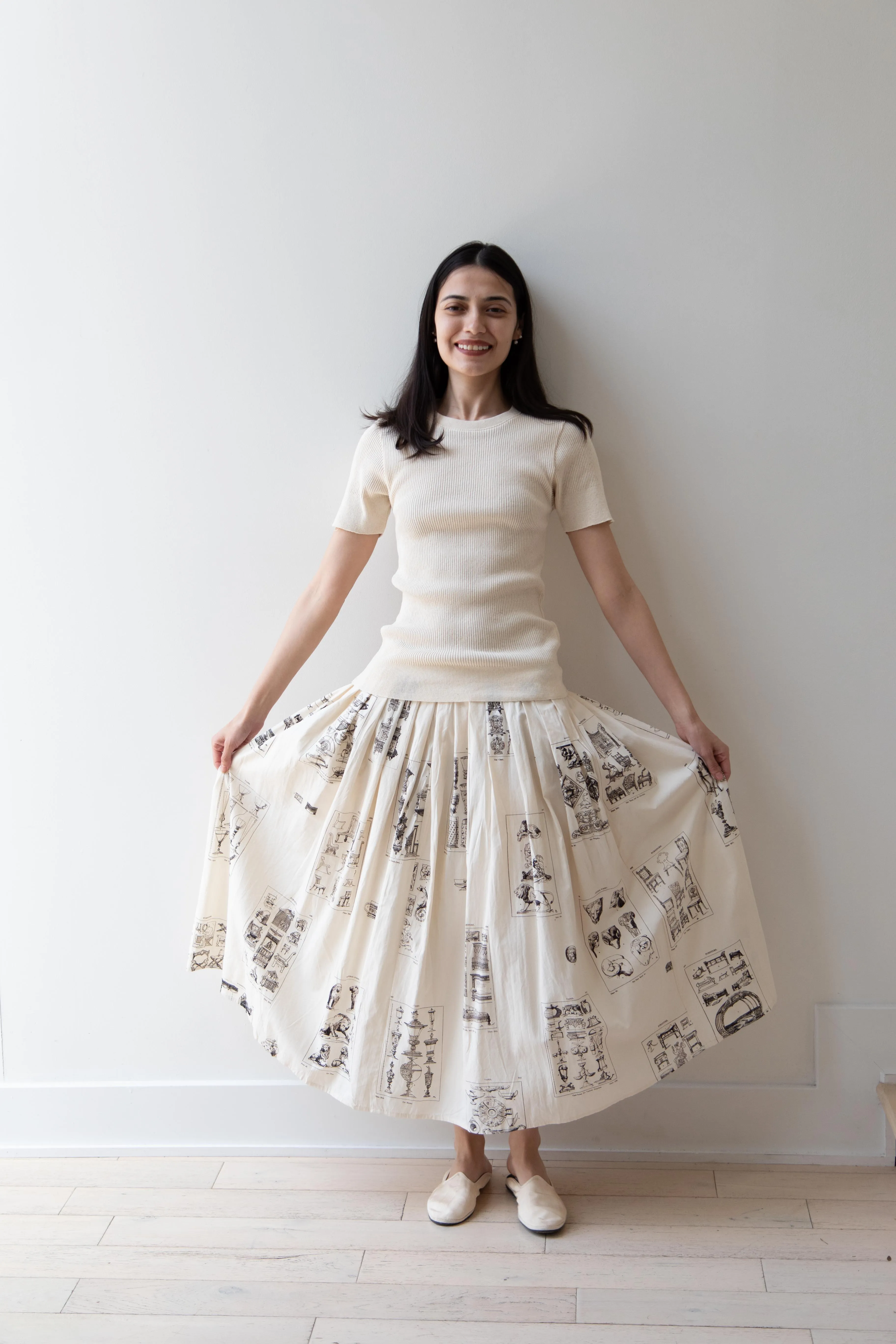 Aleksandr Manamïs | Pleated Skirt in Architectural Ornaments
