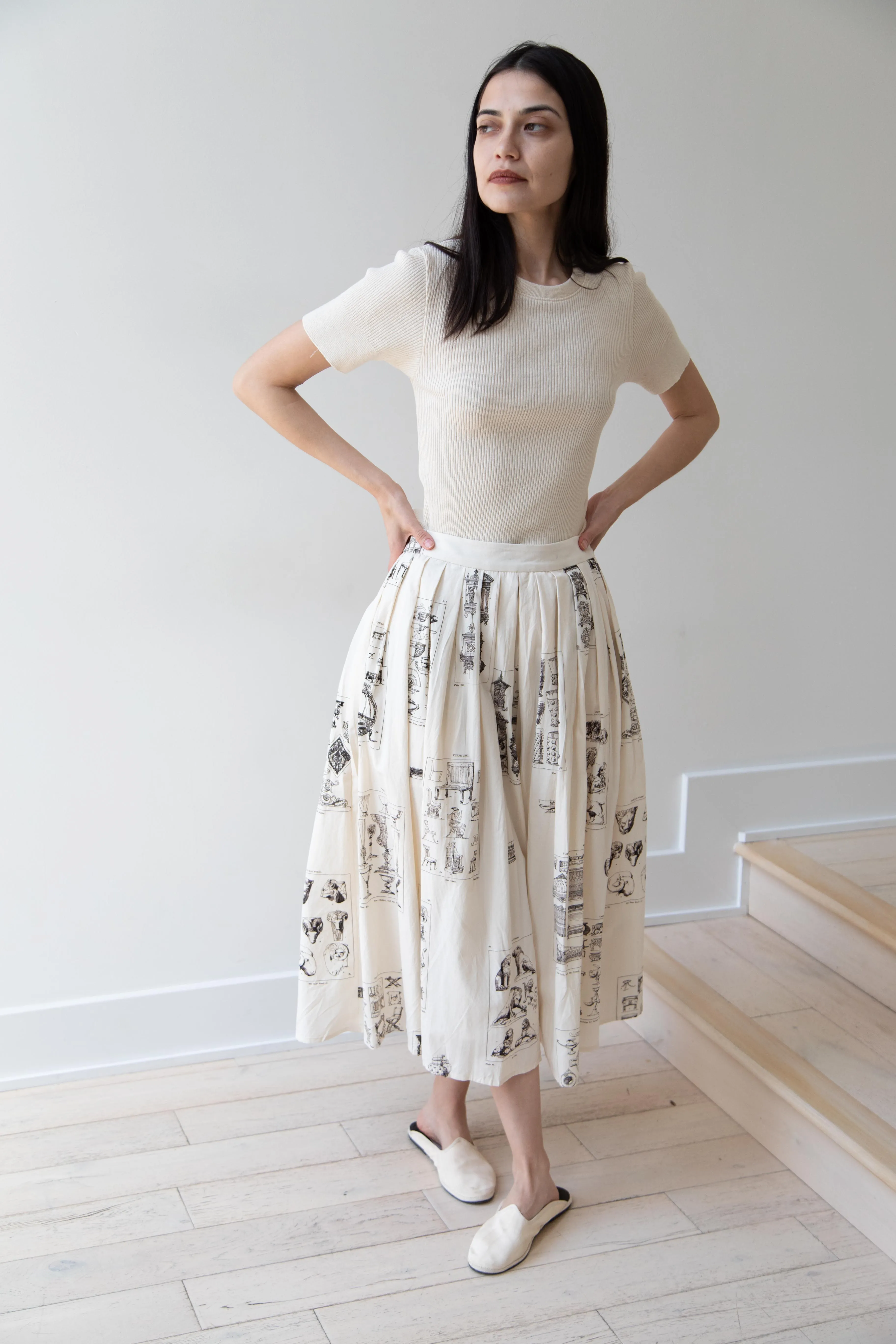 Aleksandr Manamïs | Pleated Skirt in Architectural Ornaments