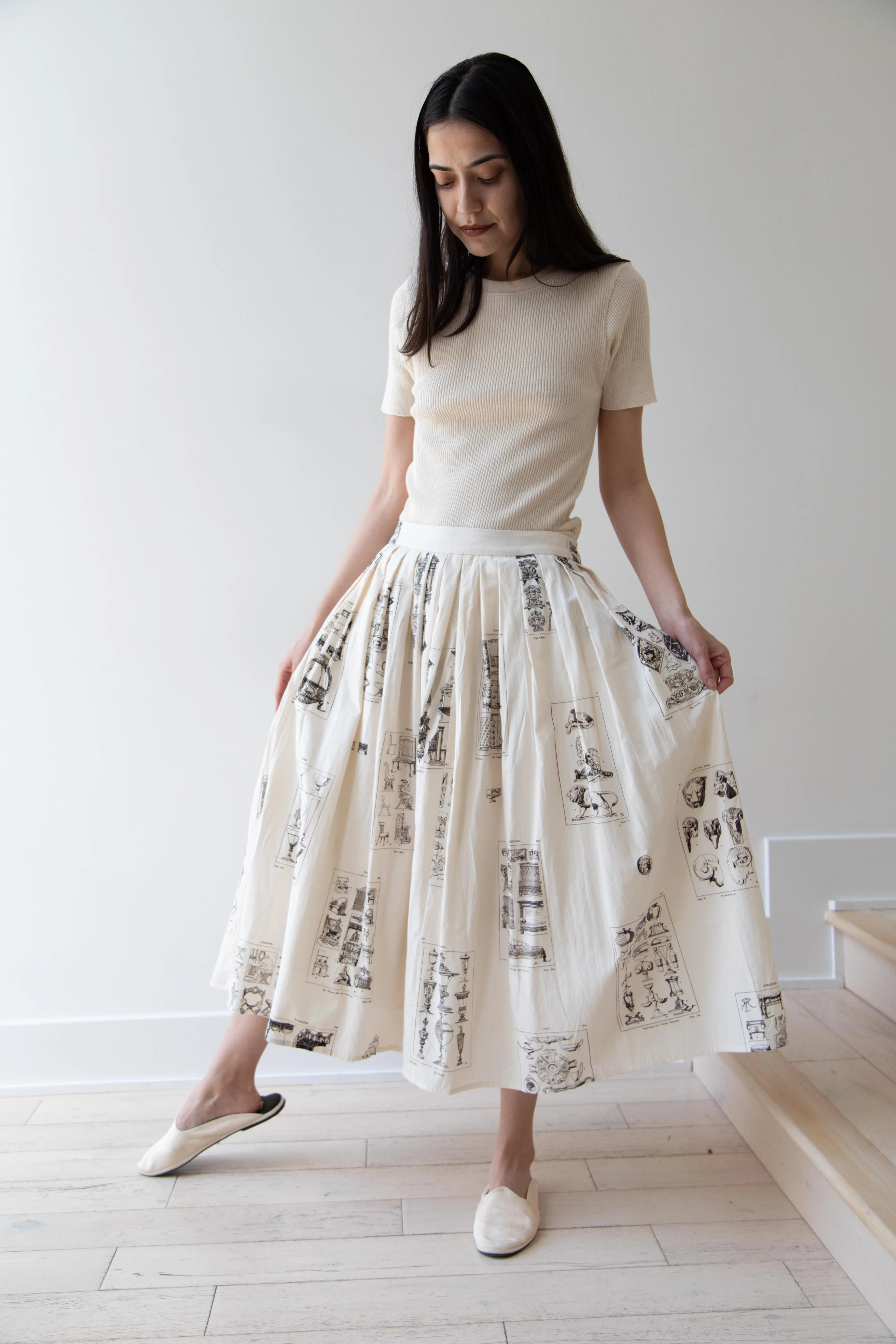 Aleksandr Manamïs | Pleated Skirt in Architectural Ornaments