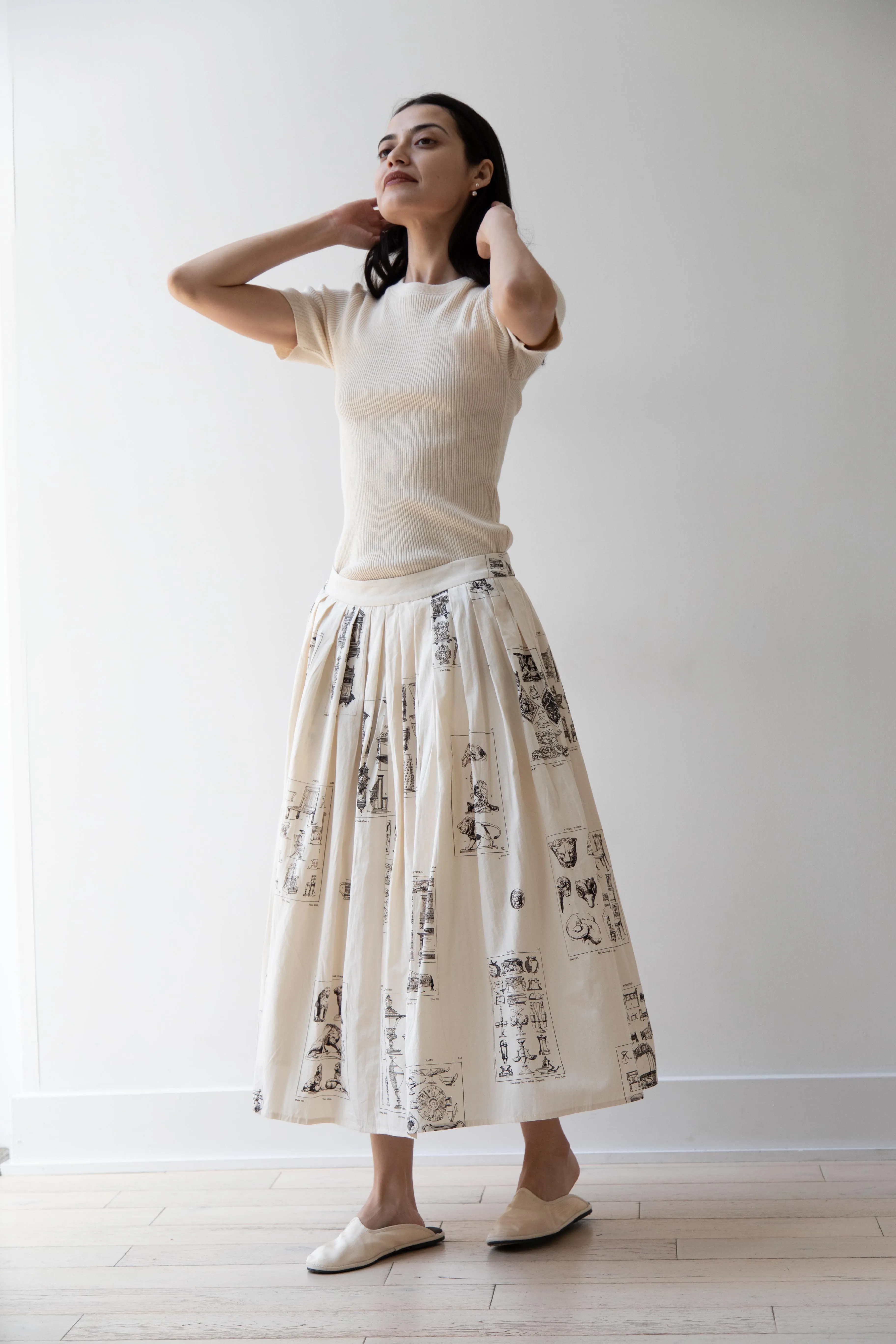 Aleksandr Manamïs | Pleated Skirt in Architectural Ornaments