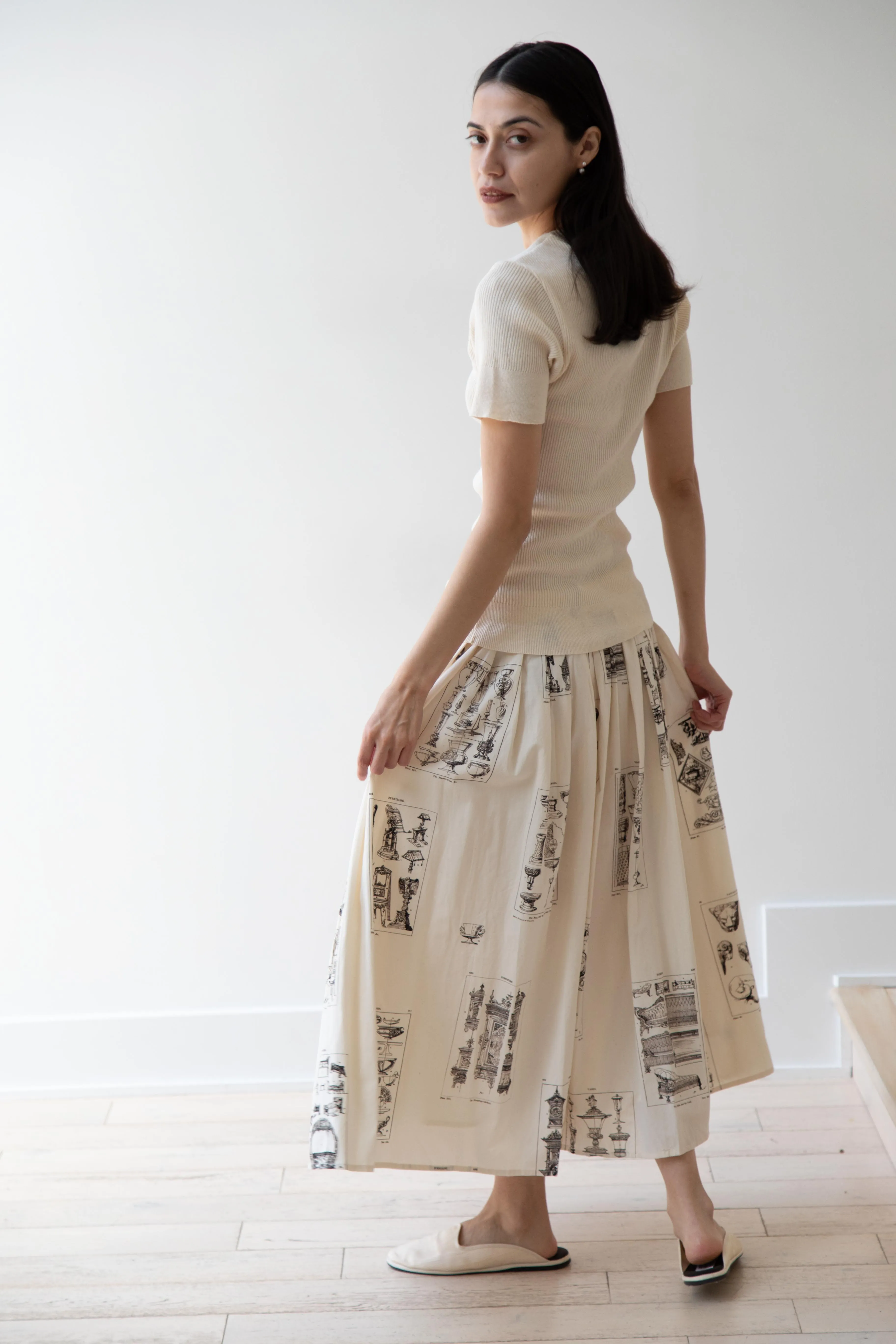 Aleksandr Manamïs | Pleated Skirt in Architectural Ornaments