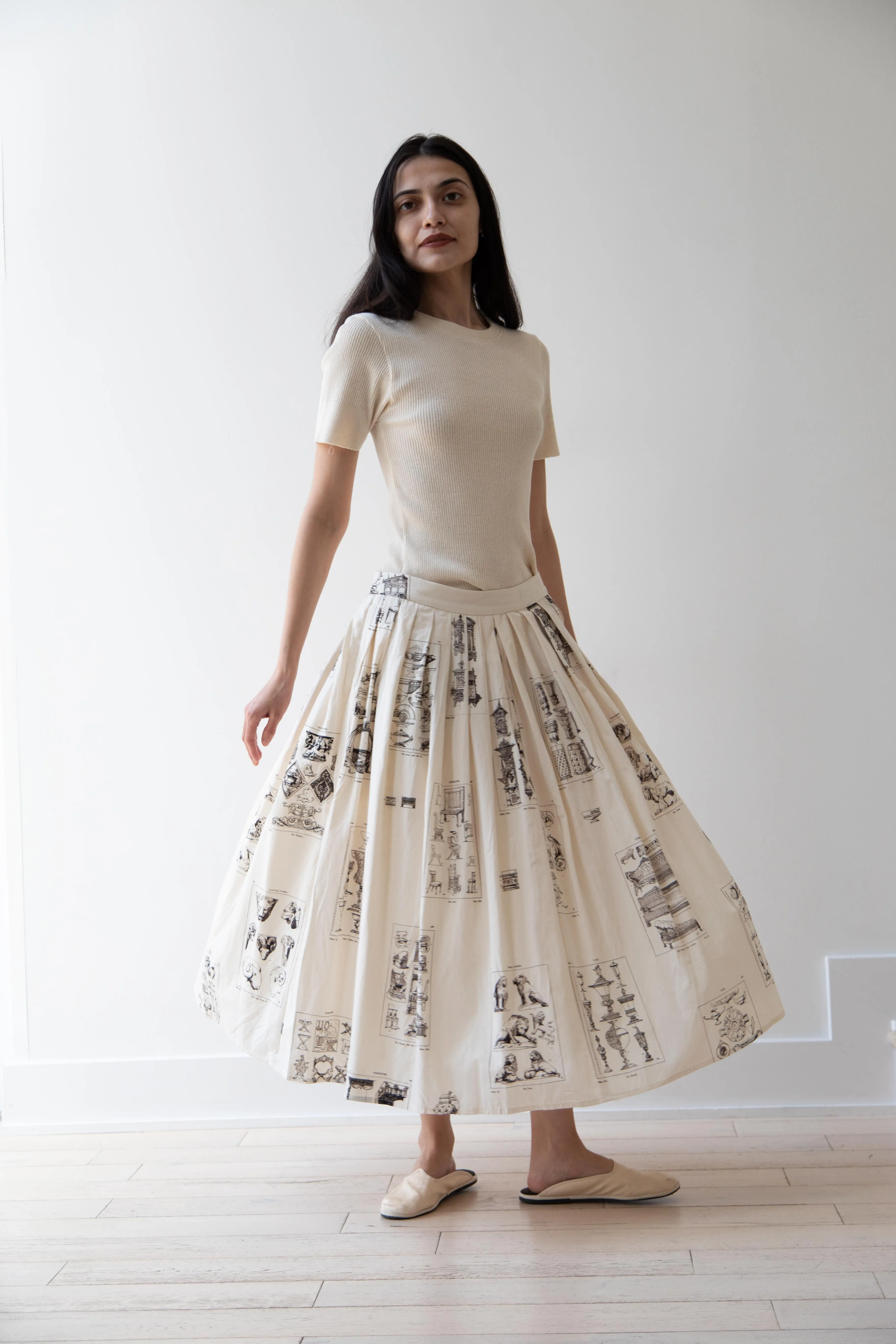 Aleksandr Manamïs | Pleated Skirt in Architectural Ornaments