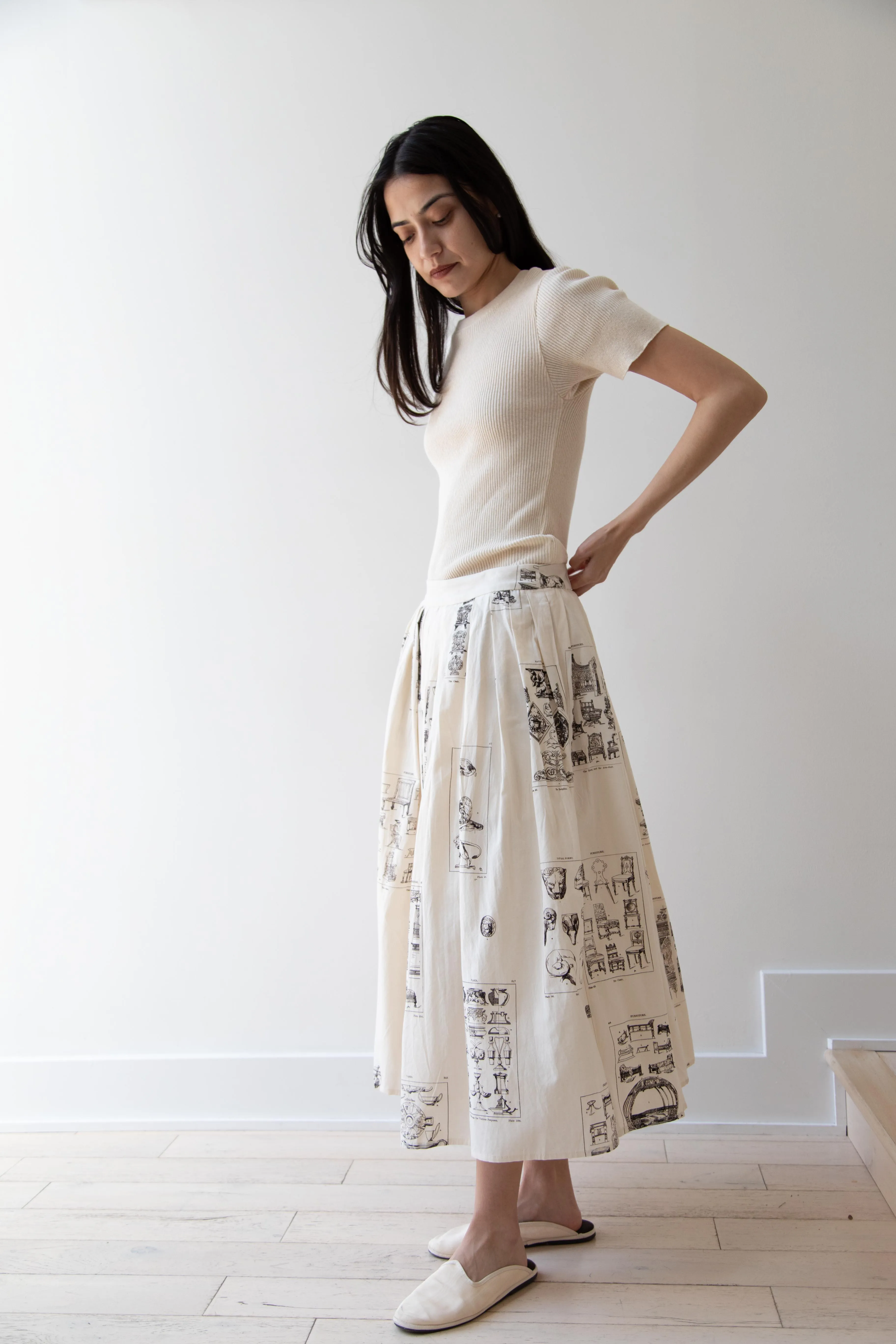 Aleksandr Manamïs | Pleated Skirt in Architectural Ornaments
