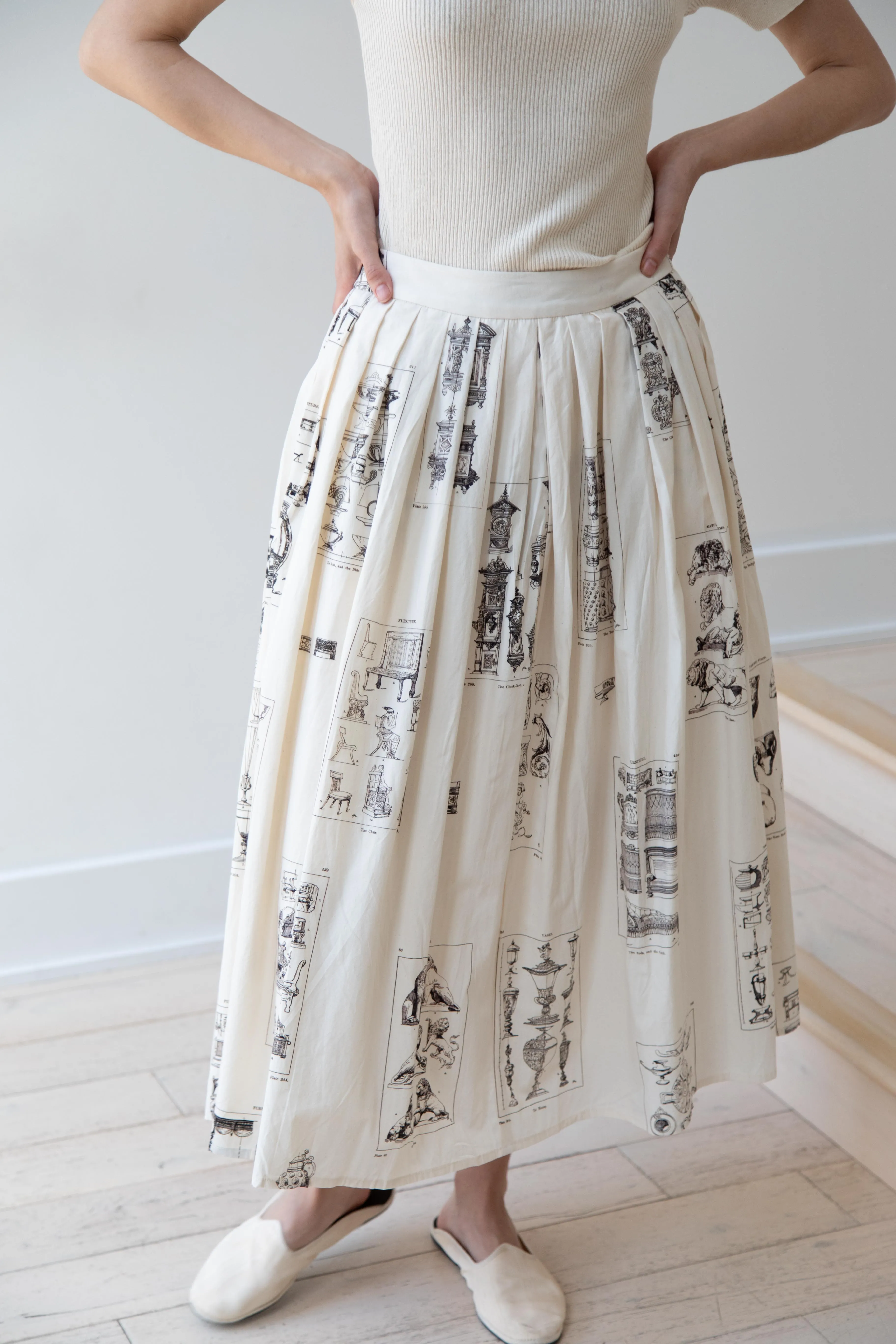 Aleksandr Manamïs | Pleated Skirt in Architectural Ornaments