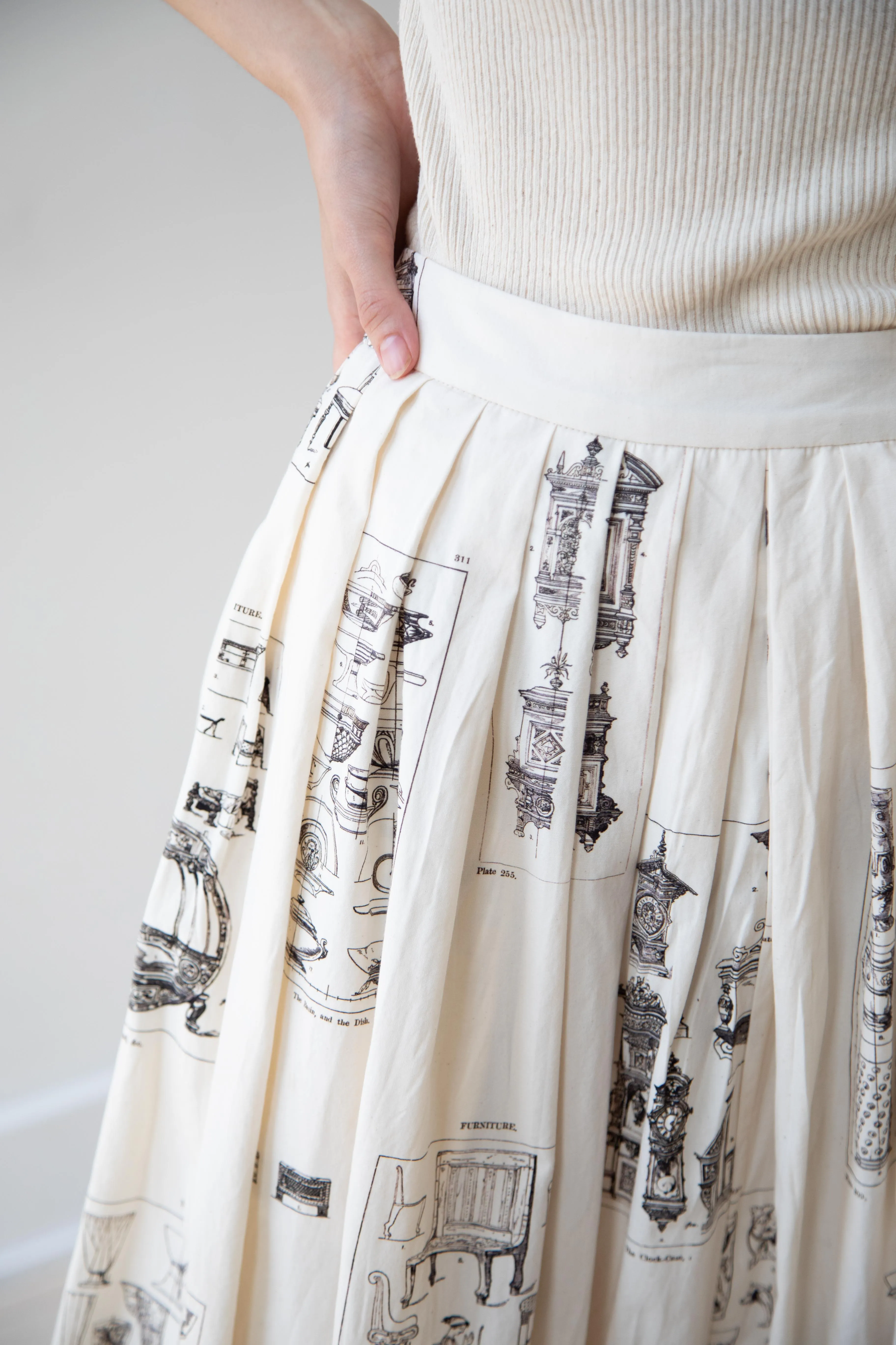 Aleksandr Manamïs | Pleated Skirt in Architectural Ornaments