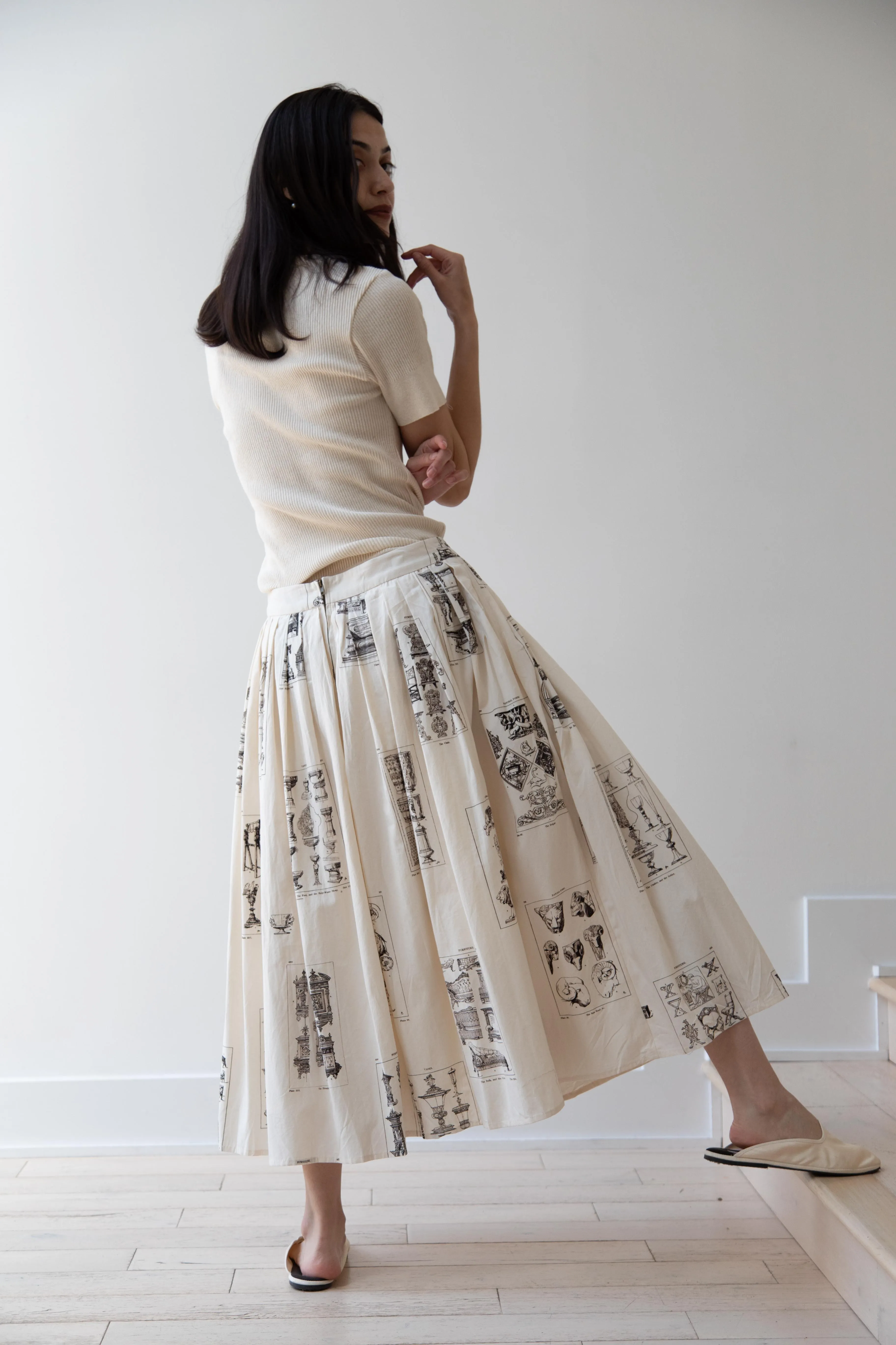 Aleksandr Manamïs | Pleated Skirt in Architectural Ornaments