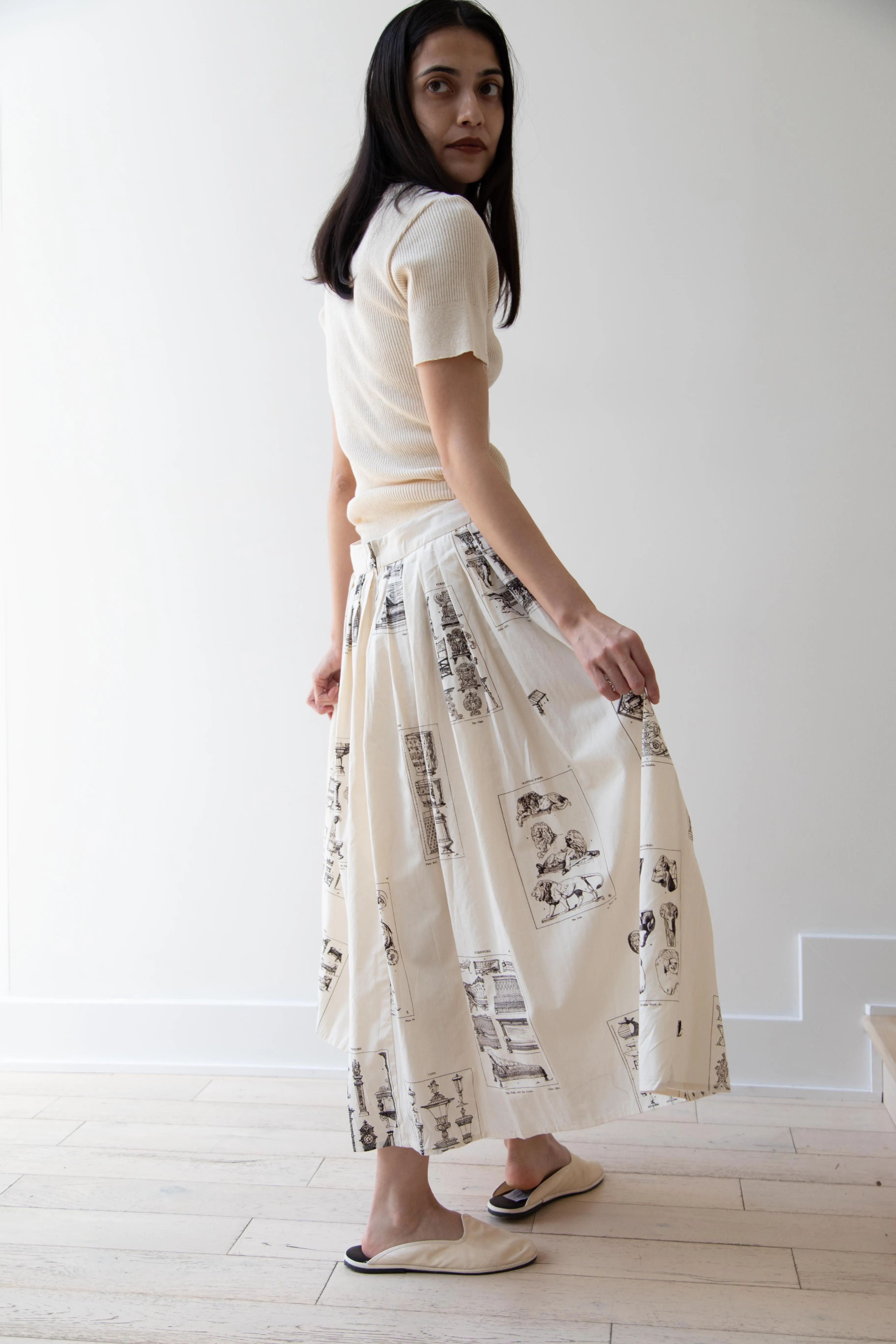 Aleksandr Manamïs | Pleated Skirt in Architectural Ornaments