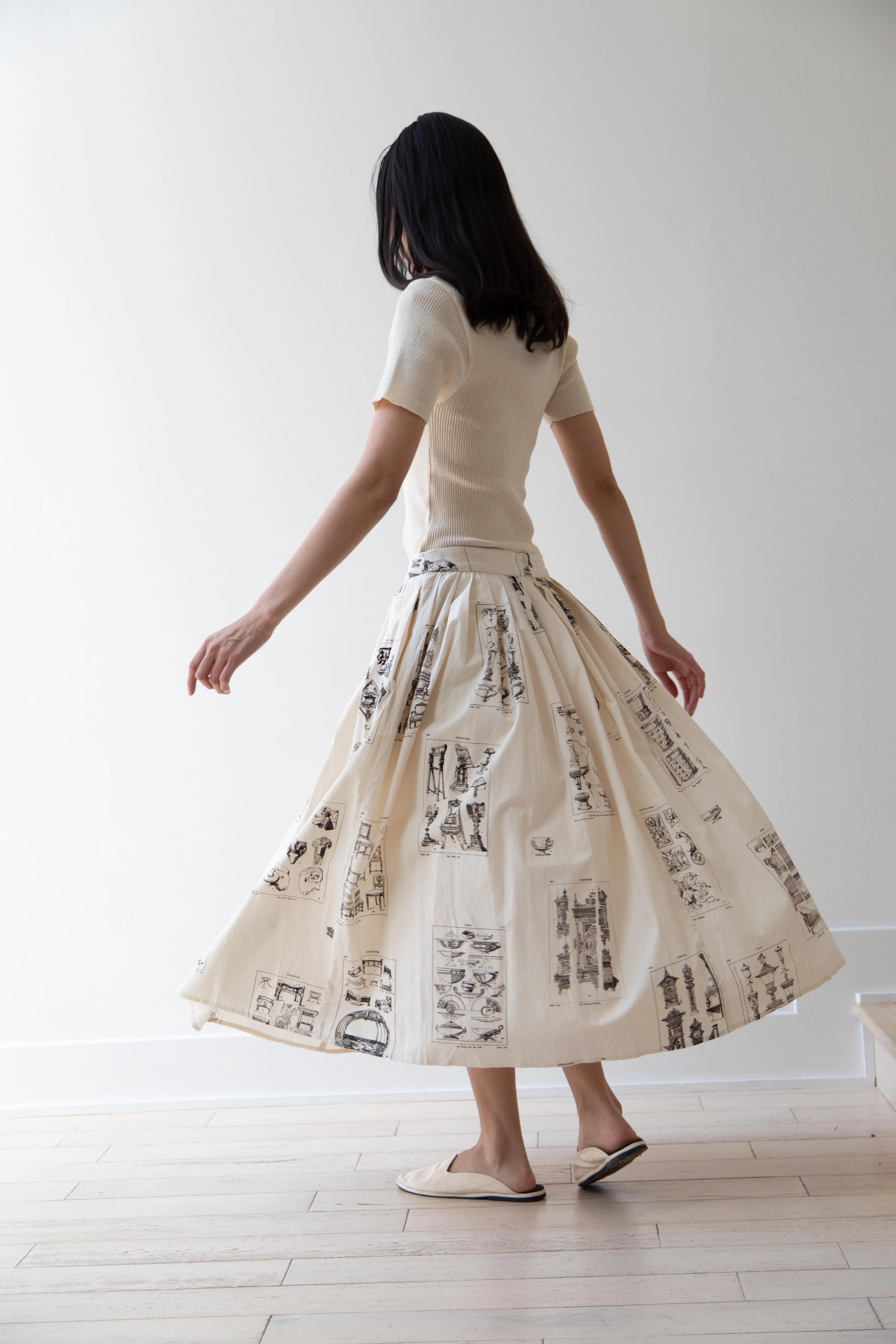 Aleksandr Manamïs | Pleated Skirt in Architectural Ornaments