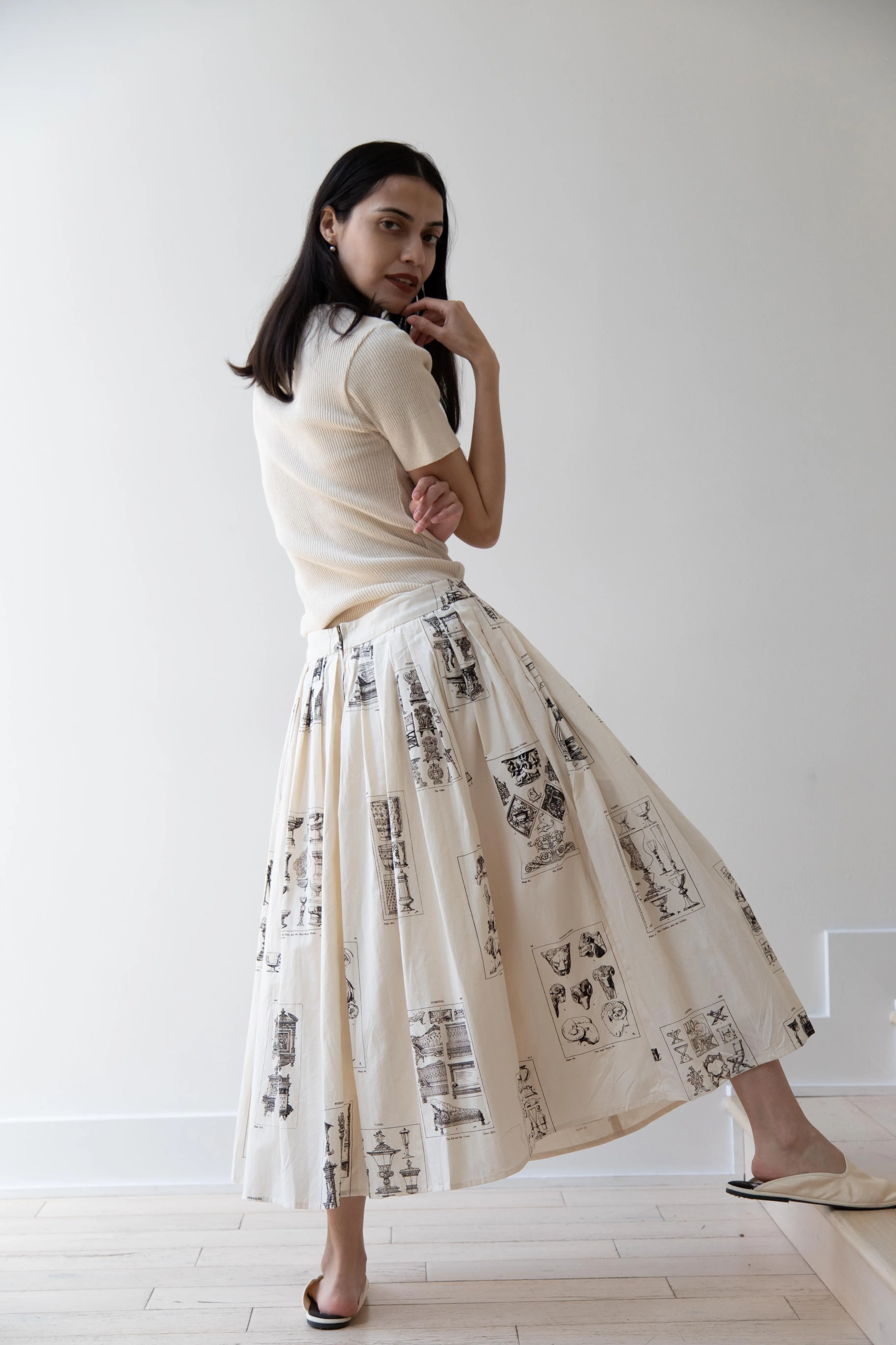 Aleksandr Manamïs | Pleated Skirt in Architectural Ornaments