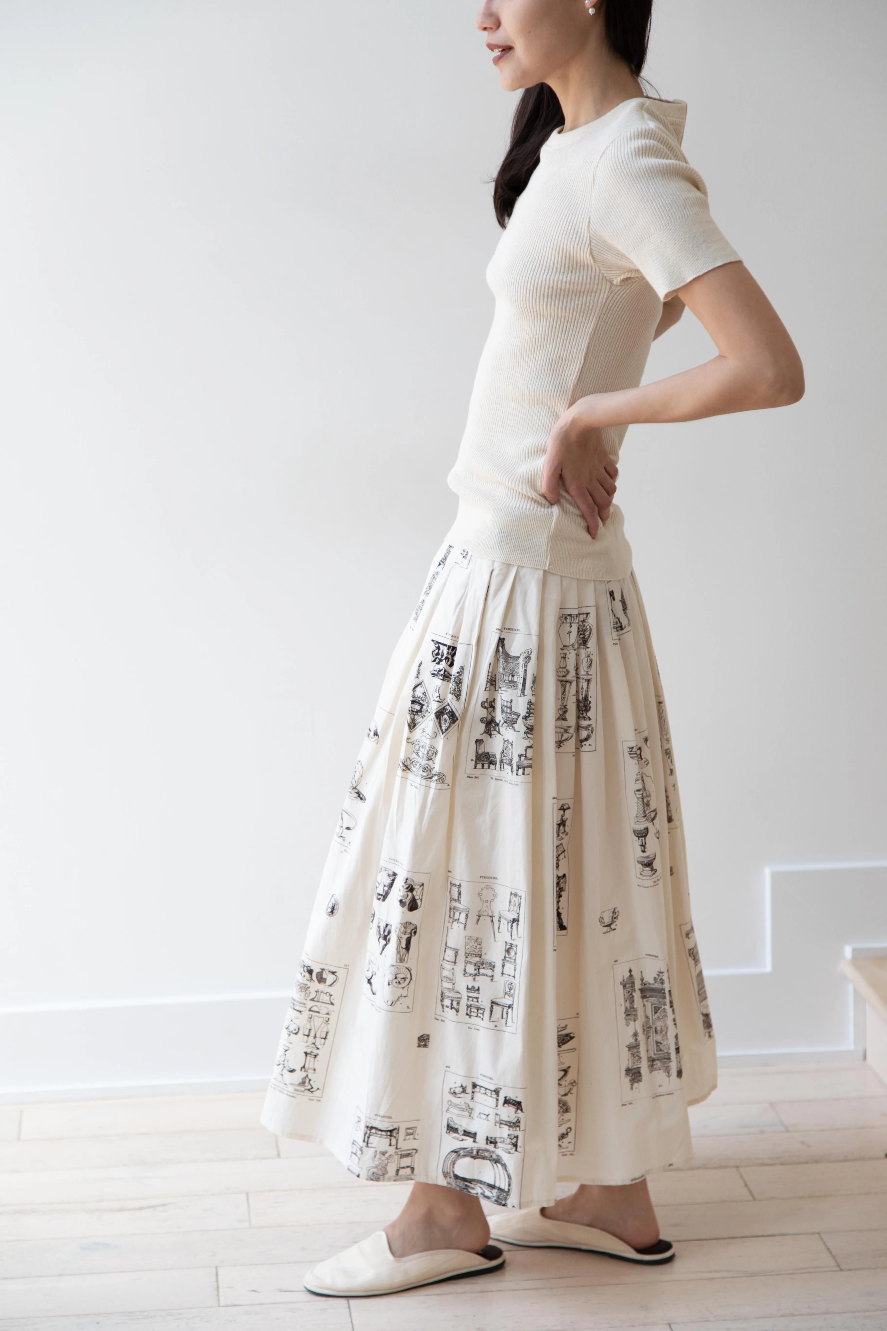 Aleksandr Manamïs | Pleated Skirt in Architectural Ornaments