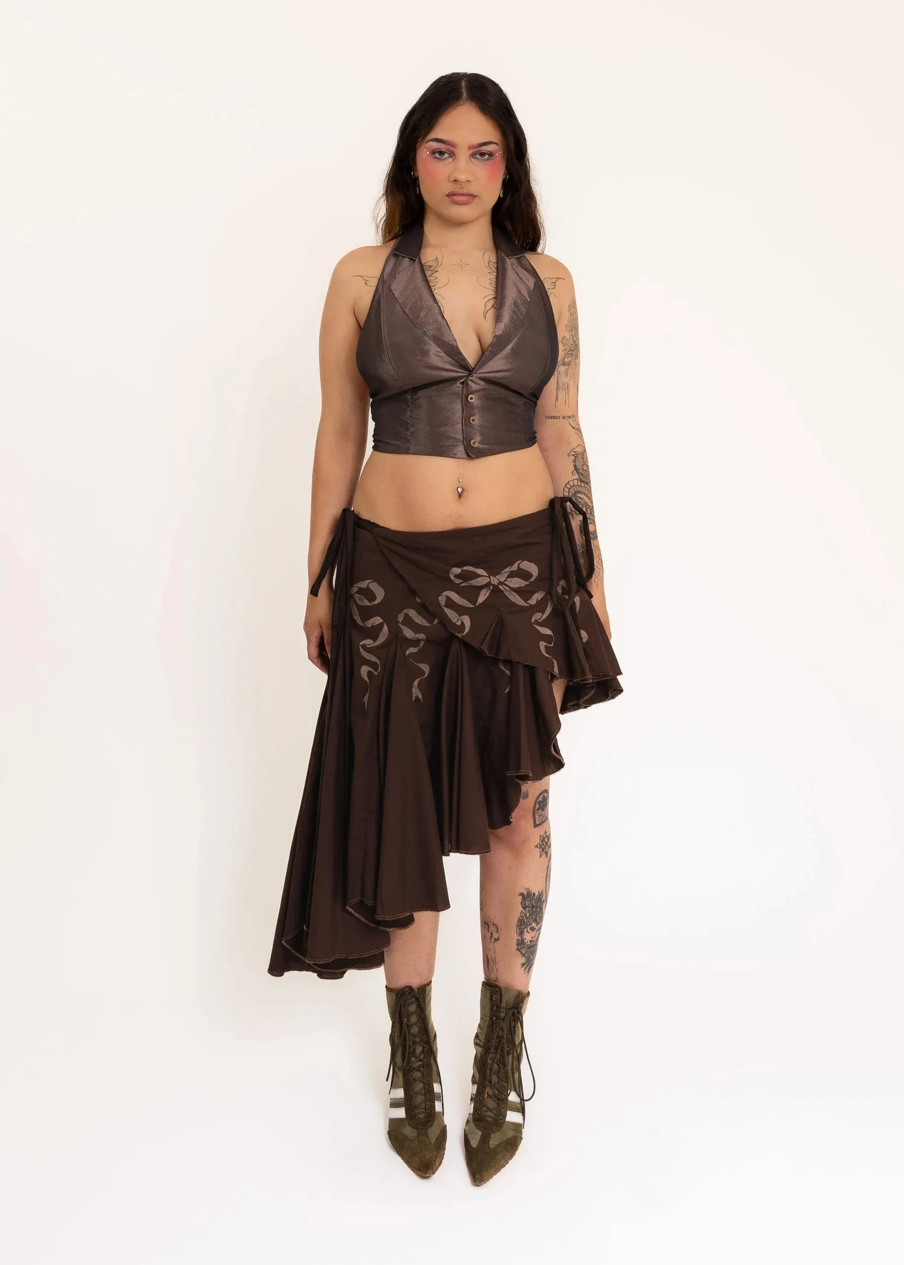 Asymmetric wrap skirt with hand-painted bow stencils
