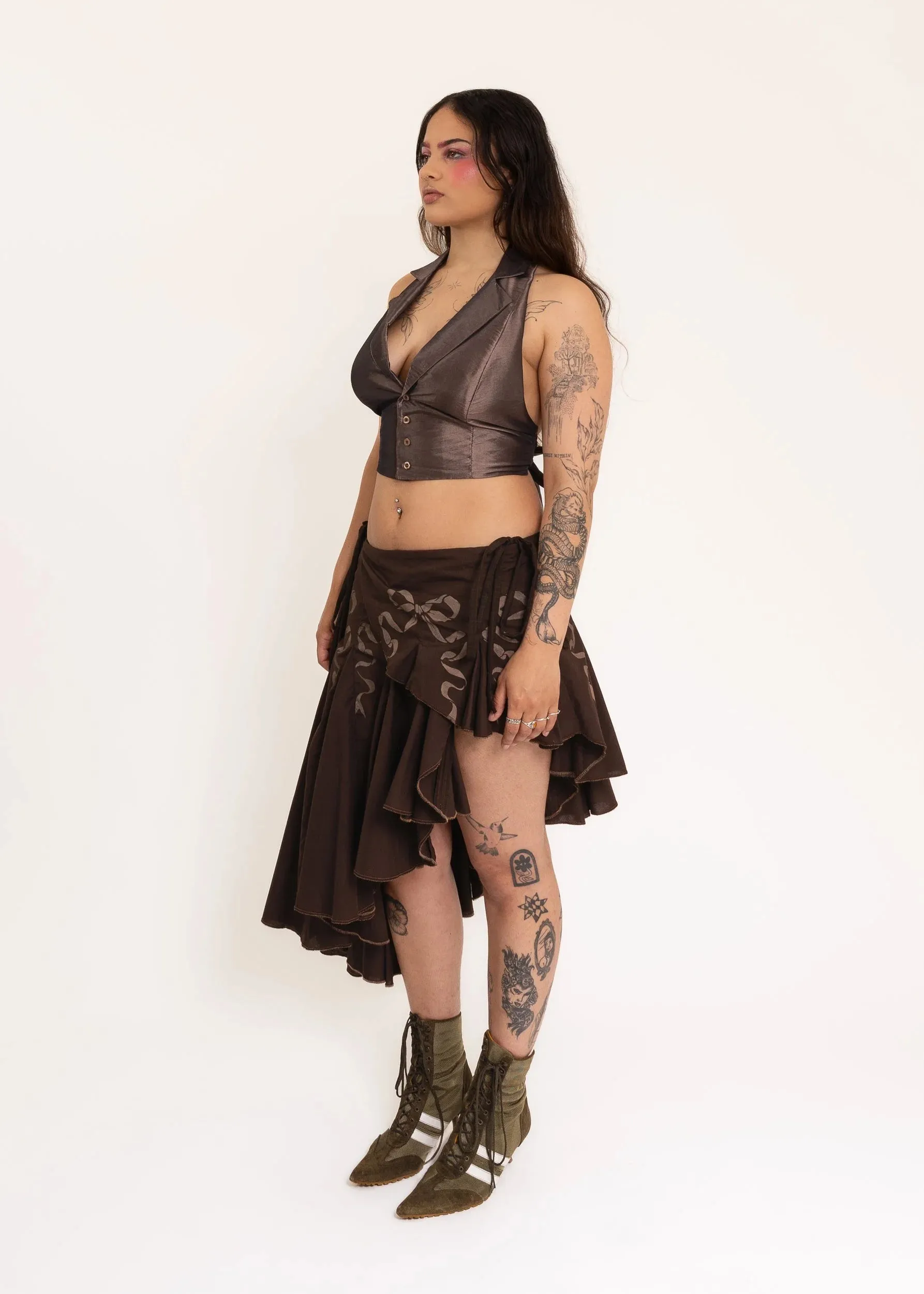 Asymmetric wrap skirt with hand-painted bow stencils