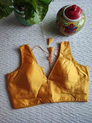 Saffron Yellow Cotton By Silk Padded Sleeveless Blouse with Broad U Neckline (With Attachable Sleeves)