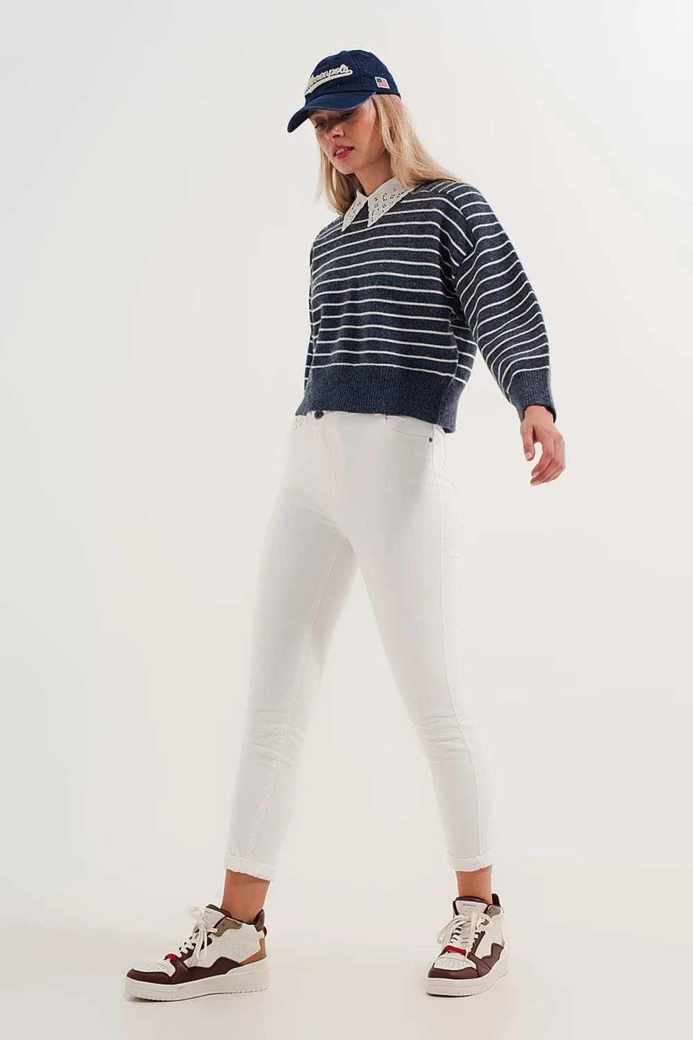 Striped knitted sweater with wrangler sleeves blue and white