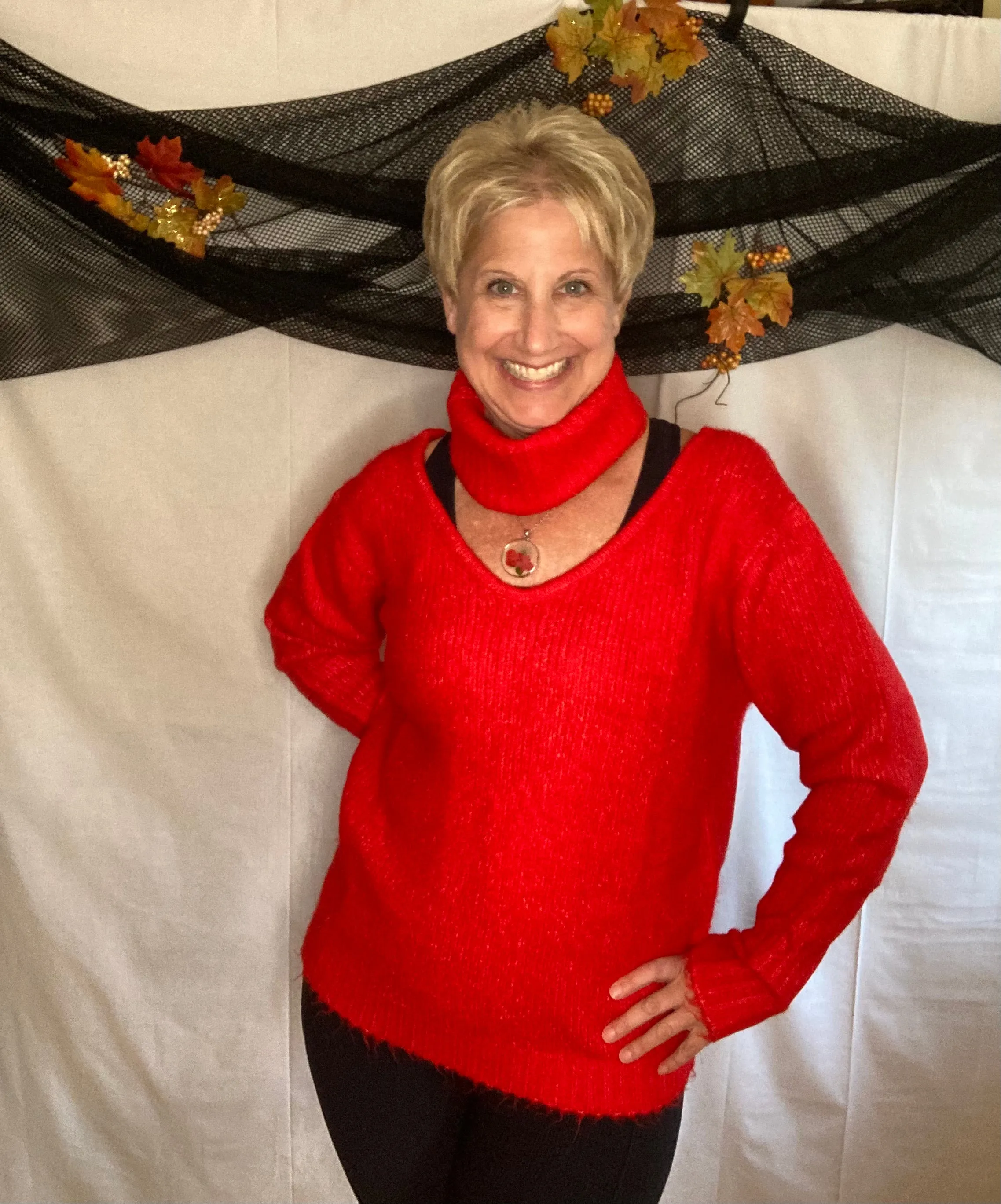 TURTLENECK CUTOUT SWEATER
